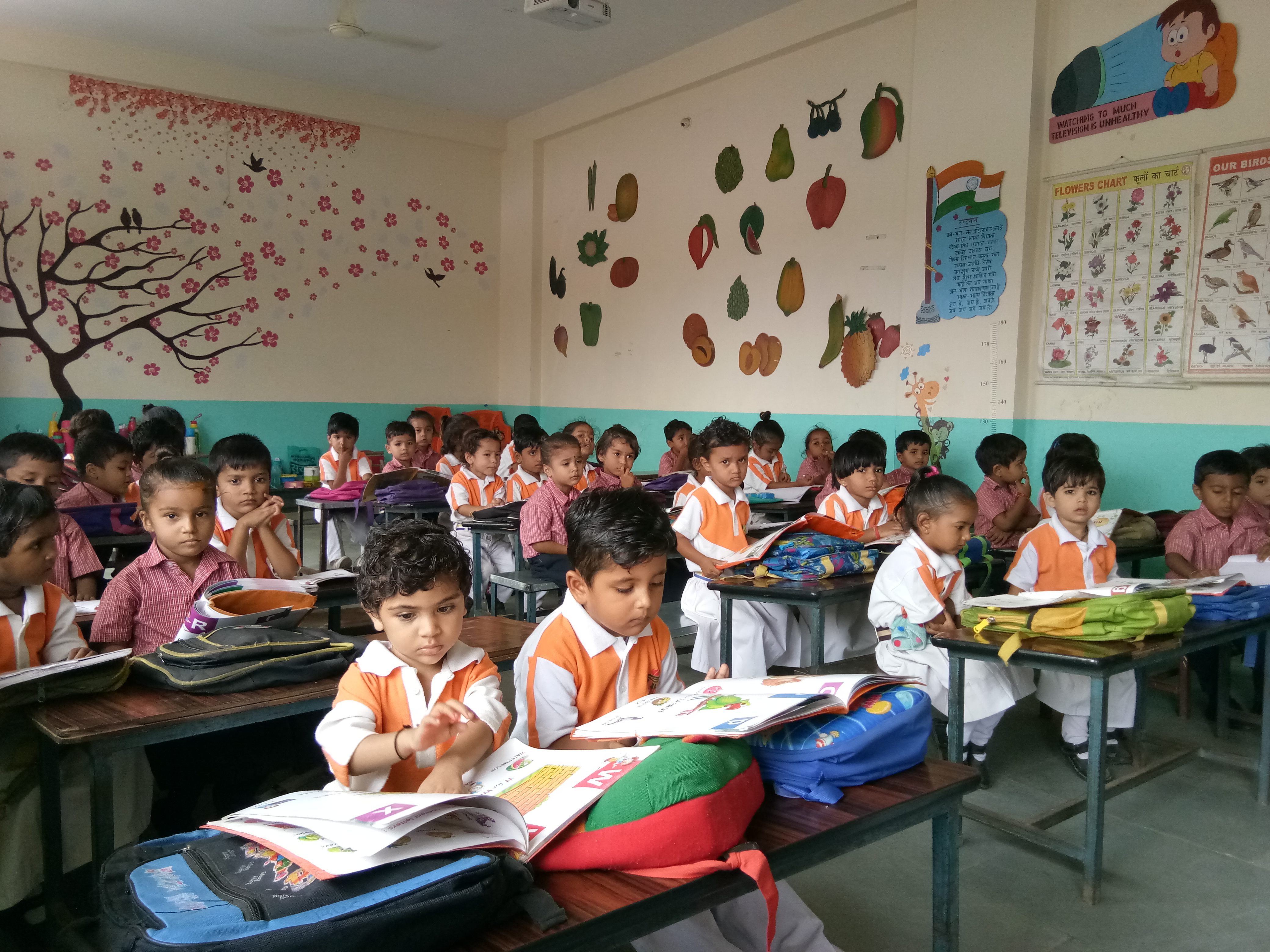 Students learning together in a bright classroom